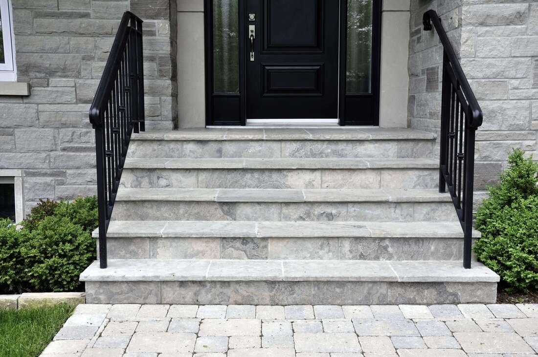 This concrete stair set was installed used decorative concrete. This type of concrete mimics a stone look.
