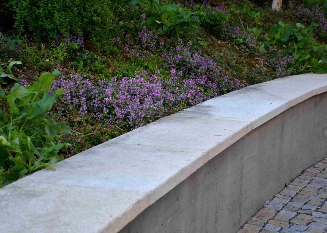This concrete retaining wall was installed in a city park in Walnut Grove. Our team made sure the pour was perfect.