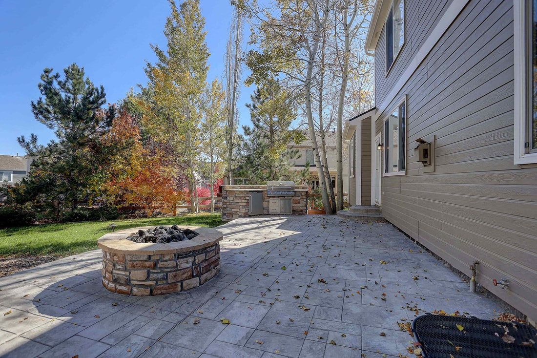 This is a photo of a stamped concrete patio. The location for this photo is Fort Langley.