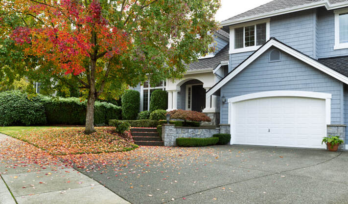 Exposed aggregate concrete was used for this concrete driveway project.
